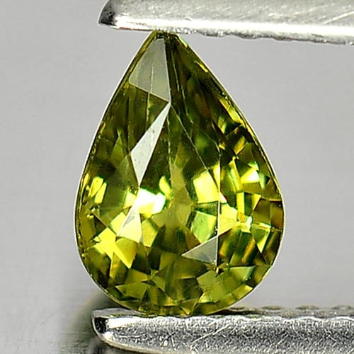 Natural Green Demantoid Garnet 0.92 Ct. VVS Pear Shape 7 x 5 Mm. Gemstone Unheated: Product ID: 802929783 / Product Name: Natural Demantoid / Weight: 0.92 CT. / Size: 7 x 5 x 3.5 MM. / Shape: Pear / Color: Green / Clarity:VVS / Luster: Very Good / Gems Origin: Madagascar / Treatment: