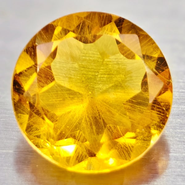 Natural Yellow Citrine 1.13 Ct. VVS Round Shape 7 Mm. Gemstone From Brazil: Product ID: 801813570 Product Name: Natural Citrine Weight: 1.13 CT. Size: 7 x 7 x 3.8 MM. Shape: Round Color: yellow Clarity:VVS Luster: Good Gems Origin: Brazil Treatment: Unheated Crystal Structure