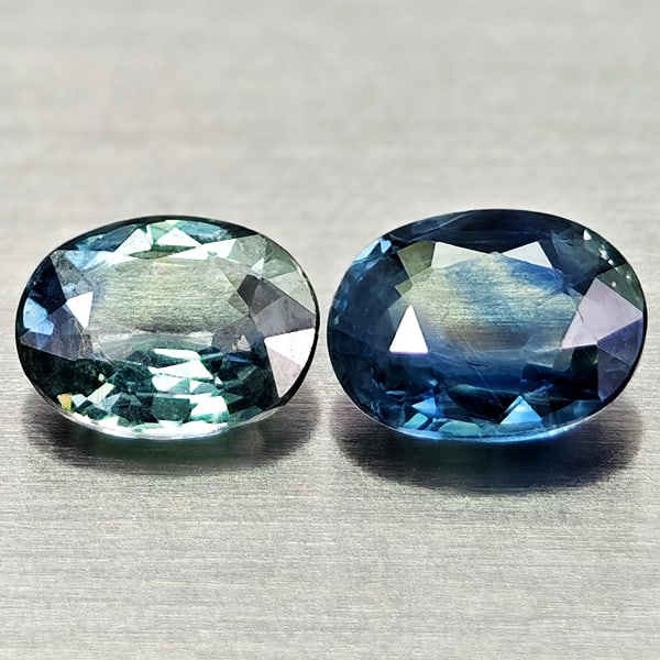 Natural Greenish Blue Sapphire 1.12 Ct. 2 Pcs Oval Shape 5.5 x 4.3 Mm. Gemstones From Thailand: Product ID: 806012130 Product Name: Natural Blue Sapphire Weight: 1.12 CT. Size: 5.5 x 4.3 x 2.2 MM. Shape: Oval Color: Blue Clarity:VSI Luster: Good Gems Origin: Thailand Treatment: Heated Crystal St