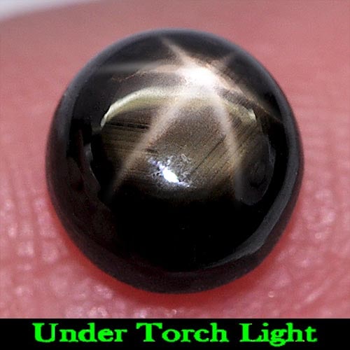 Natural Black Star Sapphire 6 Rays1.78 Ct. Round Cabochon Shape 6.4 Mm. Gemstone: Product ID: 806153922 Product Name: Natural Star Sapphire Weight: 1.78 CT. Size: 6.4 x 6.4 x 3.9 MM. Shape: Round Cabochon Color: Black Clarity:Opaque Luster: Good 6 Rays Star Gems Origin: Thailand Tr