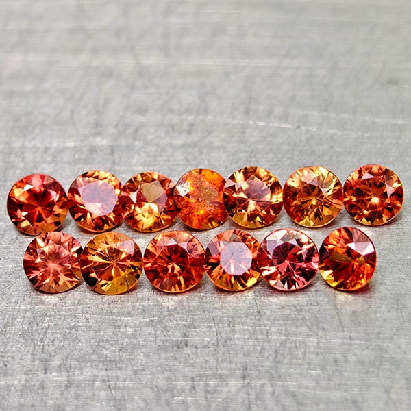 Natural Orange Red Songea Sapphire 1.33 Ct. 13 Pcs Round Diamond Cut 2.8 Mm Gemstones From Tanzania: Product ID: 806162088 Product Name: Natural Orange Sapphire Weight: 1.33 CT. Size: 2.8 x 2.8 x 1.8 MM. Shape: Round Diamond Cut Color: Orange Red Clarity:VSI Luster: Very Good Gems Origin: Tanzania Tr