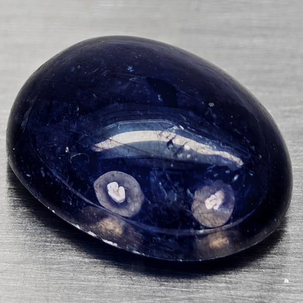 Natural Blue Sapphire 9.82 Ct. Oval Cabochon Shape 13.7 x 11 Mm Gemstone From Madagascar: Product ID: 806012349 Product Name: Natural Blue Sapphire Weight: 9.82 CT. Size: 13.7 x 11 x 6.2 MM. Shape: Oval Cabochon Color: Blue Clarity:Semi - Transparent Luster: Good Gems Origin: Madagascar Tr