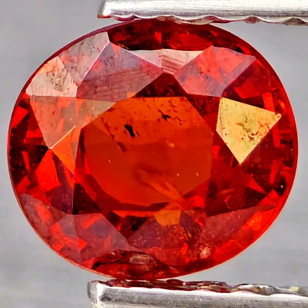 Natural Orangish Red Spessartine Garnet 0.98 Ct. Oval Shape 6 x 5.5 Mm Gemstones From Namibia: Product ID: 802937372 Product Name: Natural Garnet Weight: 0.98 CT. Size: 6 x 5.5 x 3.3 MM. Shape: Oval Shape Color: Orangish Red Clarity:SI1 Luster: Good Gems Origin: Namibia Treatment: Unheated Crys