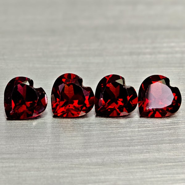 Natural Purplish Red Rhodolite Garnet 3.71 Ct. 4 Pcs Heart Shape 6 Mm Gemstones From Madagascar: Product ID: 802936686 Product Name: Natural Rhodolite Weight: 3.71 CT. Size: 6 x 6 x 3.3 MM. Shape: Heart Shape Color: Purplish Red Clarity:VSI Luster: Good Gems Origin: Madagascar Treatment: Unheated