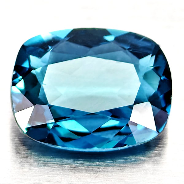 Natural London Blue Topaz 2.24 Ct. Cushion Shape 9.4 x 7.3 Mm Gemstone From Brazil: Product ID: 807168334 Product Name: Natural Blue Topaz Weight: 2.24 CT. Size: 9.4 x 7.3 x 3.7 MM. Shape: Cushion Shape Color: London Blue Clarity:VVS - VSI Luster: Good Gems Origin: Brazil Treatment: