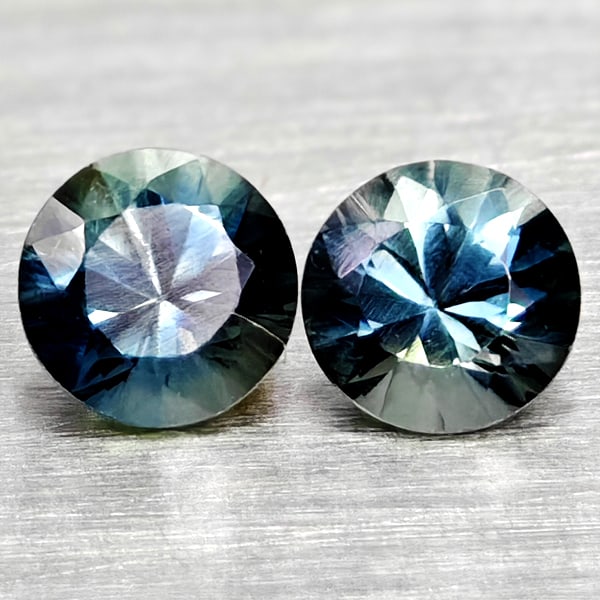 Natural Fancy Color Sapphire 0.39 Ct. 2 Pcs Round Diamand Cut 3.4 Mm Gemstones From Tanzania: Product ID: 806162243 Product Name: Natural Green Sapphire Weight: 0.39 CT. Size: 3.4 x 3.4 x 2.5 MM. Shape: Round Diamond Cut Color: Fancy Color Clarity:VSI Luster: Very Good Gems Origin: Tanzania Tr