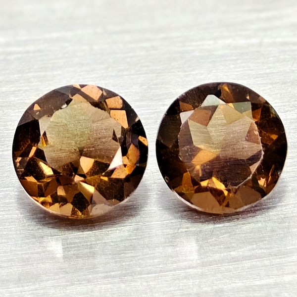 Natural Smokey Quartz 1.22 Ct. 2 Pcs Round Shape 5.7 Mm Gemstones From Brazil: Product ID: 805529913 Product Name: Natural Quartz Weight: 1.22 CT. Size: 5.7 x 5.7 x 3.7 MM. Shape: Round Color: Smokey Clarity:VSI Luster: Good Gems Origin: Brazil Treatment: Unheated Crystal Struct