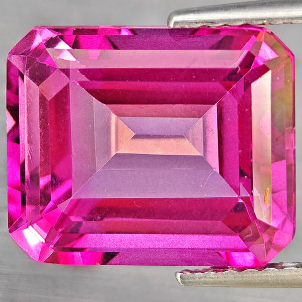 Natural Pink Topaz 5.43 Ct. Octagon Shape 11 x 9 Mm. Gemstone From Brazil: Product ID: 807168679 Product Name: Natural Topaz Weight: 5.43 CT. Size: 11 x 9 x 5.8 MM. Shape: Octagon Color: Pink Clarity:VSI Luster: Good Gems Origin: Brazil Treatment: Treated Crystal Structure:
