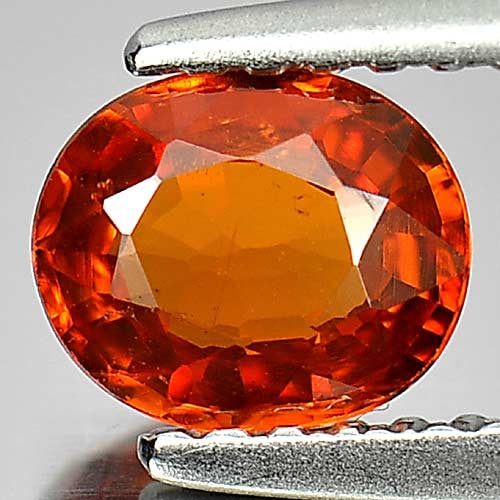 Natural Orange Spessartine Garnet 0.88 Ct. Oval Shape 6.2 x 5.3 Mm. Unheated Gemstone From Namibia: Product ID: 802934623 Product Name: Natural Spessartine Weight: 0.88 CT. Size: 6.2 x 5.3 x 2.8 MM. Shape: Oval Color: Orange Clarity:VSI Luster: Good Gems Origin: Namibia Treatment: Unheated Crystal S