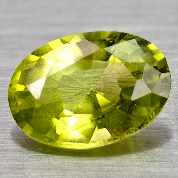 Natural Green Peridot 0.67 Ct. Oval Shape 6.7 x 4.7 Mm Gemstone From Madagascar: Product ID: 105300606 Product Name: Natural Peridot Weight: 0.67 CT. Size: 6.7 x 4.7 x 2.8 MM. Shape: Oval Color: Green Clarity:SI Luster: Good Gems Origin: Madagascar Treatment: Unheated Crystal Stru