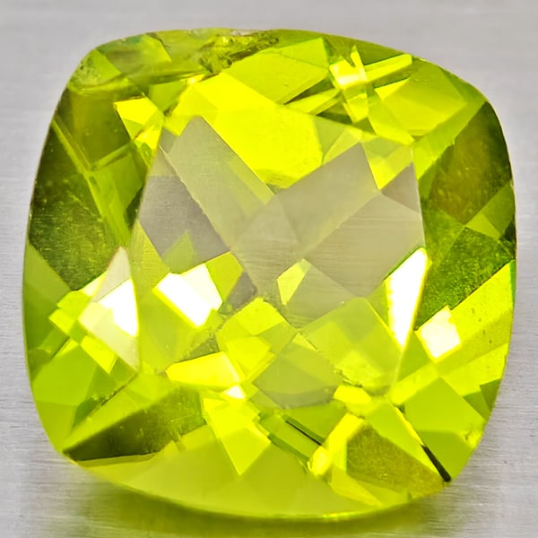 Natural Green Peridot 1.41 Ct. Cushion Shape 7.1 Mm Gemstone From Pakistan: Product ID: 805317237 Product Name: Natural Peridot Weight: 1.41 CT. Size: 7.1 x 7.1 x 4.1 MM. Shape: Cushion Shape Color: Green Clarity:VSI - SI1 Luster: Good Gems Origin: Pakistan Treatment: Unheate