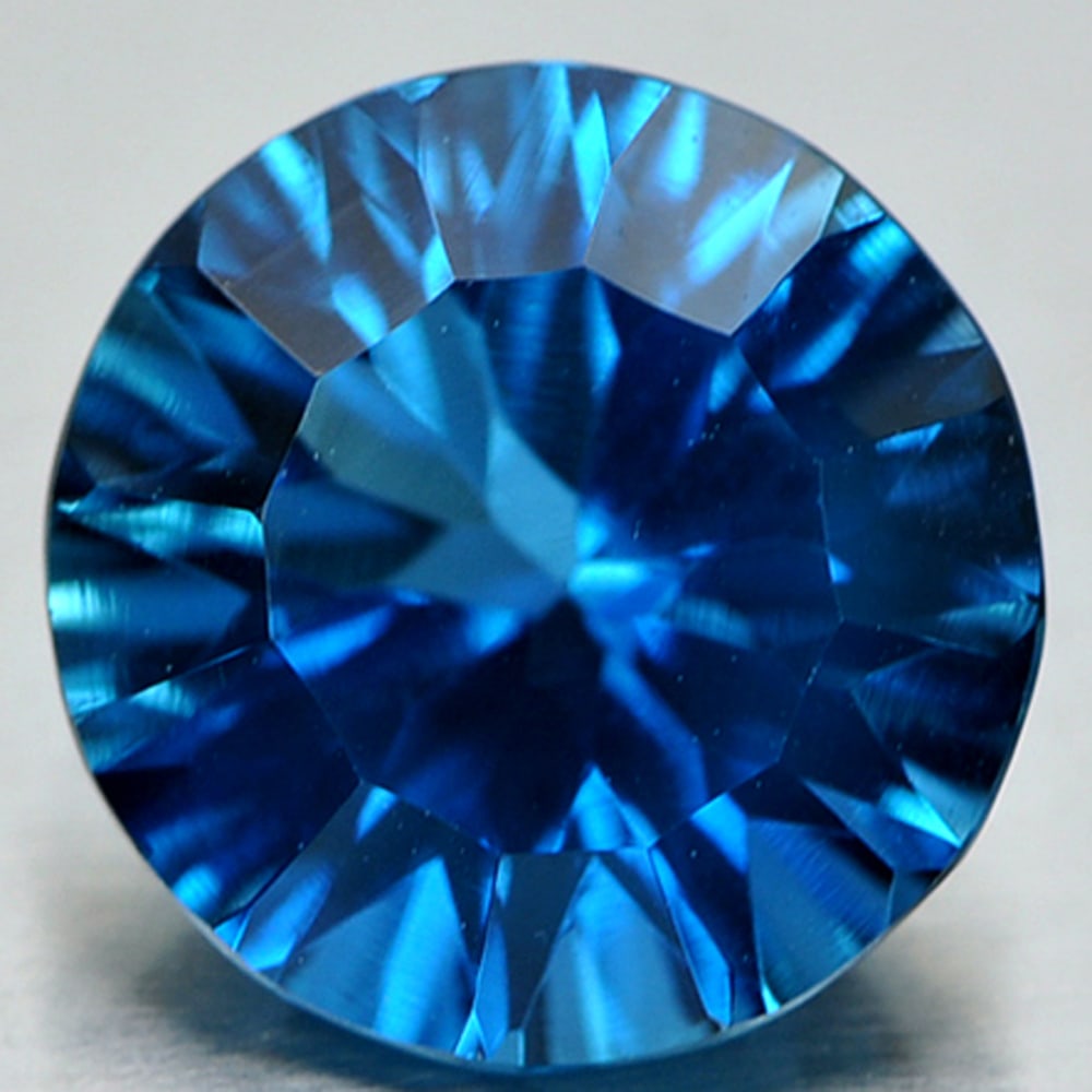 Natural London Blue Topaz 3.67 Ct. VVS Round Concave Cut 10 Mm. Gemstone From Brazil: Product ID: 807146467 Product Name: Natural Blue Topaz Weight: 3.67 CT. Size: 10 x 10 x 5.8 MM. Shape: Round Concave Cut Color: Blue Clarity:VVS Luster: Good Gems Origin: Brazil Treatment: Treated Cry