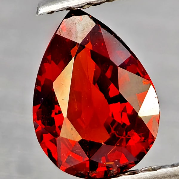 Natural Orangish Red Spessartine Garnet 0.86 Ct. Pear Shape 7.1 x 6.3 Mm Gemstones From Namibia: Product ID: 802937351 Product Name: Natural Garnet Weight: 0.86 CT. Size: 7.1 x 6.3 x 3 MM. Shape: Pear Shape Color: Orangish Red Clarity:SI1 Luster: Good Gems Origin: Namibia Treatment: Unheated Crys
