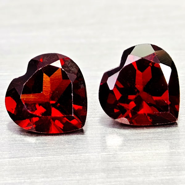 Natural Orangish Red Garnet 2.81 Ct. 2 Pcs Heart Shape 7.1 x 7.1 MM Gemstones From Tanzania: Product ID: 802936617 Product Name: Natural Red Garnet Weight: 2.81 CT. Size: 7.1 x 7.1 x 4.1 MM. Shape: Heart Shape Color: Orangish Red Clarity:VSI Luster: Good Gems Origin: Tanzania Treatment: Unhea