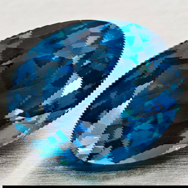 Natural London Blue Topaz 4.04 Ct. Oval Shape 10.5 x 8.4 Mm Gemstone From Brazil: Product ID: 807168389 Product Name: Natural Blue Topaz Weight: 4.04 CT. Size: 10.5 x 8.4 x 5.8 MM. Shape: Oval Shape Color: London Blue Clarity:VVS - VSI Luster: Good Gems Origin: Brazil Treatment: Tr