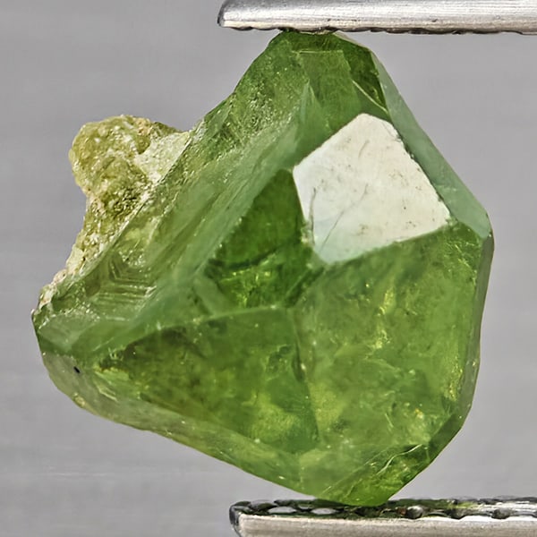 Natural Multi Color Green Demantoid Garnet 3.64 Ct. Rough Mixed Shape 8.7 x 7.1 Mm Gemstone from: Product ID: 802937418 Product Name: Natural Demantoid Weight: 3.64 CT. Size: 8.7 x 7.1 x 7 MM. Shape: Rough Mixed Shape Color: Multi-Color Green Clarity:None Luster: Good Gems Origin: Madagascar Treat