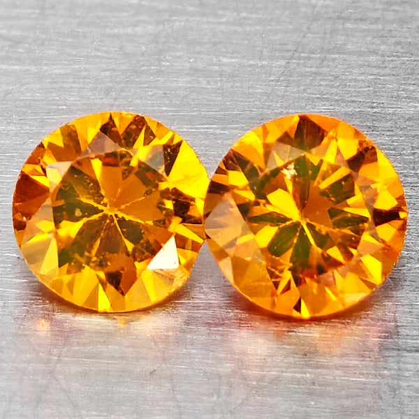 Natural Orange Yellow Sapphire 0.37 Ct. 2 Pcs Round Diamond Cut 3.2 Mm Gemstones From Thailand: Product ID: 806162963 Product Name: Natural Yellow Sapphire Weight: 0.37 CT. Size: 3.2 x 3.2 x 2 MM. Shape: Round Diamond Cut Color: Orange Yellow Clarity:VSI Luster: Good Gems Origin: Thailand Treatm