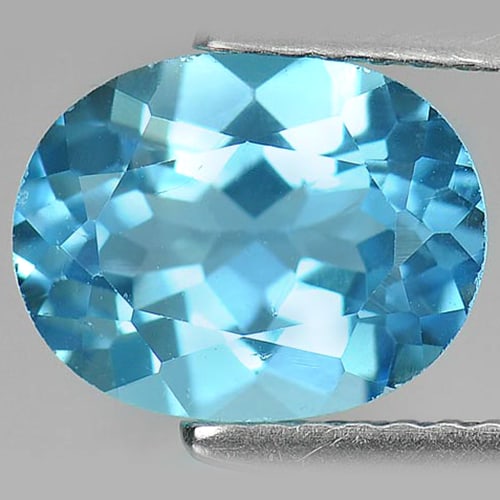 Natural Swiss Blue Topaz 2.26 Ct. VVS Oval Shape 9 x 7 Mm. Gemstone From Brazil: Product ID: 807163078 Product Name: Natural Blue Topaz Weight: 2.26 CT. Size: 9 x 7 x 4.8 MM. Shape: Oval Color: Swiss Blue Clarity:VVS Luster: Good Gems Origin: Brazil Treatment: Treated Crystal Stru
