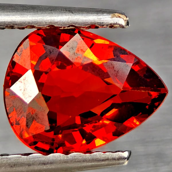 Natural Orangish Red Spessartine Garnet 1.01 Ct. Pear Shape 6.8 x 5.5 Mm Gemstones From Namibia: Product ID: 802937236 Product Name: Natural Garnet Weight: 1.01 CT. Size: 6.8 x 5.5 x 3.2 MM. Shape: Pear Shape Color: Orangish Red Clarity:VSI Luster: Good Gems Origin: Namibia Treatment: Unheated Cr