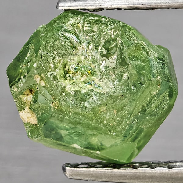 Natural Multi Color Green Demantoid Garnet 2.08 Ct. Rough Mixed Shape 8 x 6.5 Mm Gemstone From: Product ID: 802937415 Product Name: Natural Demantoid Weight: 2.08 CT. Size: 8 x 6.5 x 4.5 MM. Shape: Rough Mixed Shape Color: Multi-Color Green Clarity:None Luster: Good Gems Origin: Madagascar Treat