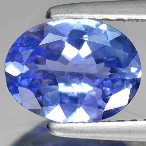 Natural Violetish Blue Tanzanite 1.39 Ct. Clean Oval Shape 8.9 x 6.9 Mm. Gemstone: Product ID: 807009332 Product Name: Natural Tanzanite Weight: 1.39 CT. Size: 8.9 x 6.9 x 3.6 MM. Shape: Oval Color: Violetish Blue Clarity:IF Luster: Good Gems Origin: Tanzania Treatment: Heated Cryst