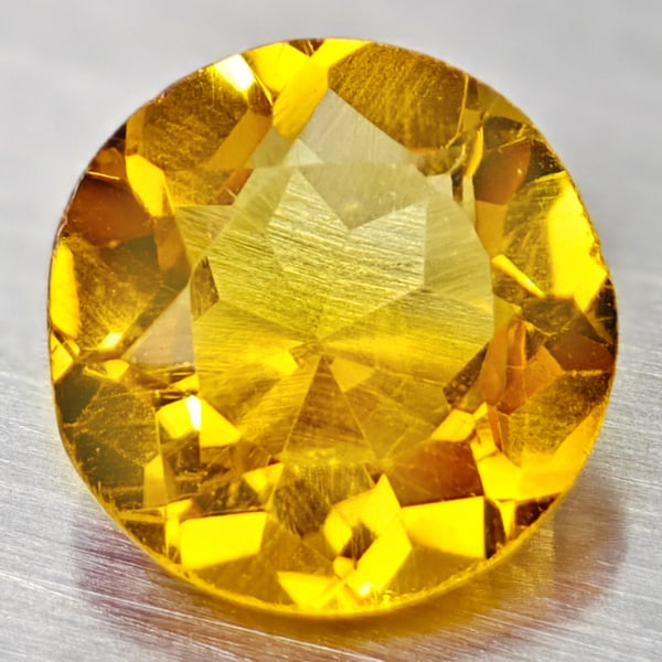 Natural Yellow Citrine 1.13 Ct. Round Shape 7 Mm. Gemstone From Brazil: Product ID: 801813564 Product Name: Natural Citrine Weight: 1.13 CT. Size: 7 x 7 x 4.2 MM. Shape: Round Color: yellow Clarity:VVS Luster: Good Gems Origin: Brazil Treatment: Unheated Crystal Structure