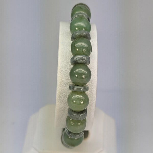 Natural Green Jade Beads Stretch Bracelet 153.51 Ct. Gemstone From Thailand: Product ID: 818102729 Product Name: Natural Jade Weight: 153.51 CT. Size: 3 x 9.5 MM. Shape: Mix Cabochon Color: Multi-Color Green Clarity:Opaque Luster: Good Gems Origin: Thailand Treatment: Unheated