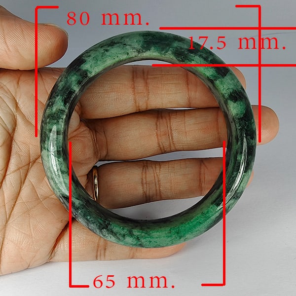 Natural Green Jade Bangle 486.58 Ct. Diameter 65 Mm. Gemstone from Thailand: Product ID: 819816155 Product Name: Natural Gemstones Weight: 486.58 CT. Size: 80 x 65 x 17.5 MM. Shape: Round Color: Multi-Color Clarity:Opaque Luster: Good Gems Origin: Thailand Treatment: Unheated