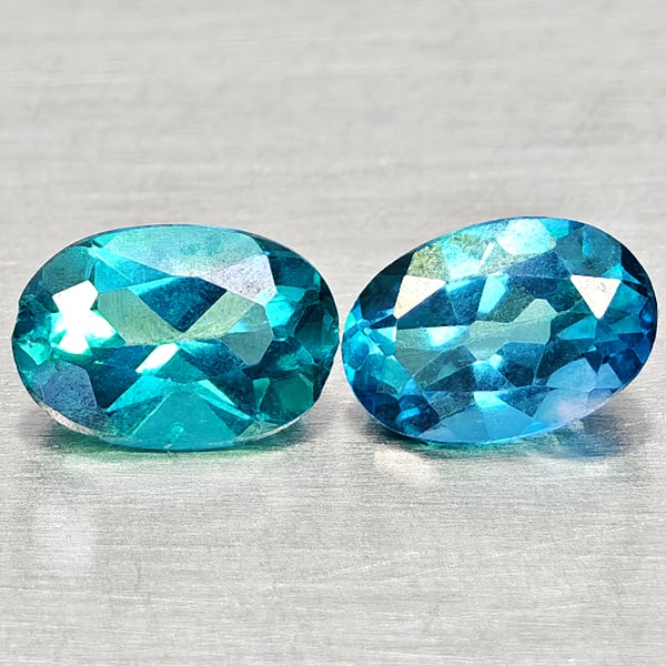 Natural Bluish Green Topaz 1.13 Ct. 2 Pcs Oval Shape 6.2 x 4.2 Mm Gemstones From Brazil: Product ID: 807168087 Product Name: Natural Topaz Weight: 1.13 CT. Size: 6.2 x 4.2 x 3 MM. Shape: Oval Color: Bluish Green Clarity:VSI Luster: Good Gems Origin: Brazil Treatment: Treated Crystal Struc