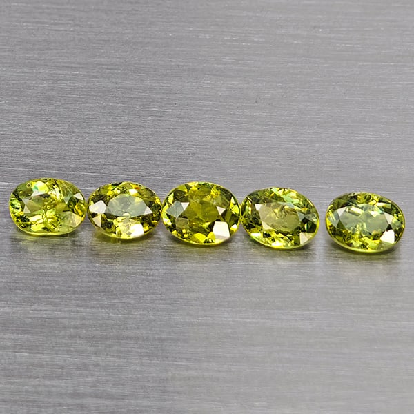 Natural Green Demantiod Garnet 1.12 Ct. 5 Pcs Oval Shape 4.2 x 3.2 Mm Gemstones From Madagascar: Product ID: 802937454 Product Name: Natural Demantoid Weight: 1.12 CT. Size: 4.2 x 3.2 x 2 MM. Shape: Oval Shape Color: Green Clarity:SI1 Luster: Good Gems Origin: Madagascar Treatment: Unheated Cryst