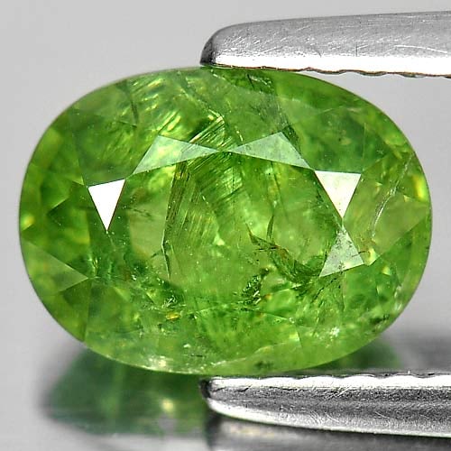 Natural Green Demantoid Garnet 1.91 Ct. Oval Shape 8.5 x 6.4 Mm Gemstone from Madagascar: Product ID: 802919323 Product Name: Natural Demantoid Weight: 1.91 CT. Size: 8.5 x 6.4 x 4.2 MM. Shape: Oval Color: Green Clarity:SI Luster: Good Gems Origin: Madagascar , Africa Treatment: Unheated C