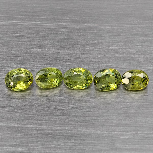 Natural Green Demantiod Garnet 1.34 Ct. 5 Pcs Oval Shape 4.2 x 3 Mm Gemstones From Madagascar: Product ID: 802937469 Product Name: Natural Demantoid Weight: 1.34 CT. Size: 4.2 x 3 x 2.5 MM. Shape: Oval Shape Color: Green Clarity:SI1 Luster: Good Gems Origin: Madagascar Treatment: Unheated Cryst