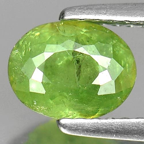Natural Green Demantoid Garnet 1.54 Ct. Oval Shape 7.6 x 5.9 Mm Gemstone From Madagascar: Product ID: 802919320 Product Name: Natural Demantoid Weight: 1.54 CT. Size: 7.6 x 5.9 x 4.1 MM. Shape: Oval Color: Green Clarity:SI Luster: Good Gems Origin: Madagascar , Africa Treatment: Unheated C