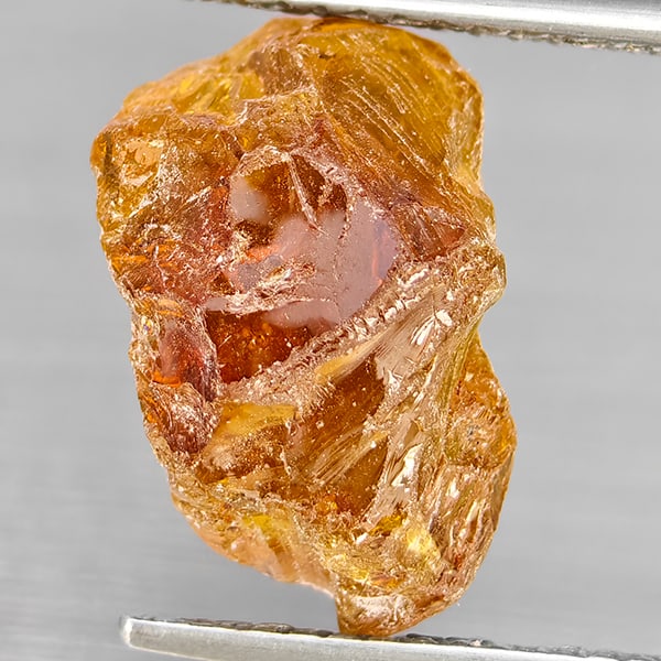 Natural Orange Yellow Tourmaline 6.71 Ct. Rough Shape 13.6 x 9 Mm Gemstone From Nigeria: Product ID: 597200096 Product Name: Natural Tourmaline Weight: 6.71 CT. Size: 13.6 x 9 x 8 MM. Shape: Rough Mixed Shape Color: Orange Yellow Clarity:None Luster: Good Gems Origin: Nigeria Treatment: U