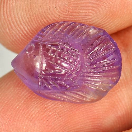 Natural Purple Amethyst 4.94 Ct. Fish Carving Shape 15.3 x 11 Mm. Gemstone from Brazil: Product ID: 810303756 Product Name: Natural Amethyst Weight: 4.94 CT. Size: 15.3 x 11 x 5.6 MM. Shape: Fish Carving Color: Purple Clarity:Semi - Transparent Luster: Good Gems Origin: Brazil Treatment: