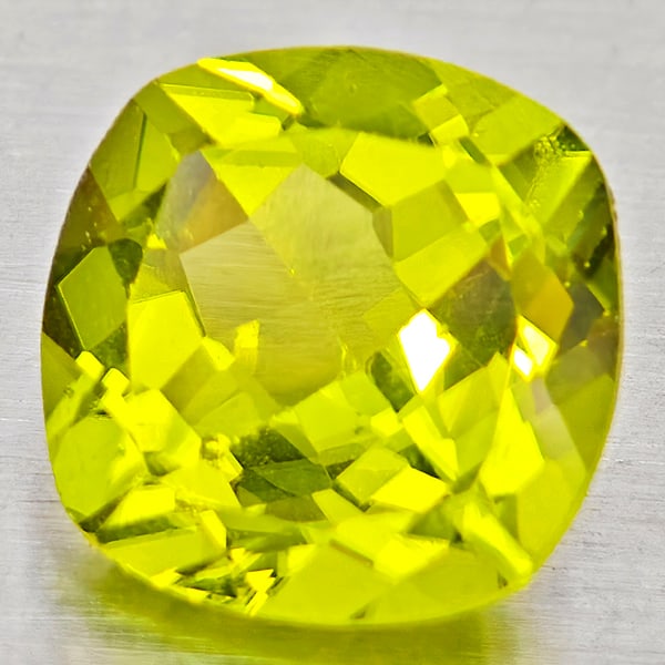 Natural Green Peridot 1.55 Ct. Cushion Shape 7.1 Mm Gemstone From Pakistan: Product ID: 805317262 Product Name: Natural Peridot Weight: 1.55 CT. Size: 7.1 x 7.1 x 4.3 MM. Shape: Cushion Shape Color: Green Clarity:VSI - SI1 Luster: Good Gems Origin: Pakistan Treatment: Unheate