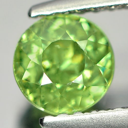 Certified Green Demantoid Garnet 1.17 Ct. Round Shape 5.49 - 5.58 Mm. Natural Gemstone Unheated From: Product ID: 802916742 Product Name: Natural Demantoid Weight: 1.17 CT. Size: 5.49 - 5.58 x 4.49 MM. Shape: Round Color: Green Clarity:SI Luster: Good Gems Origin: Madagascar , Africa Treatment: Unheat