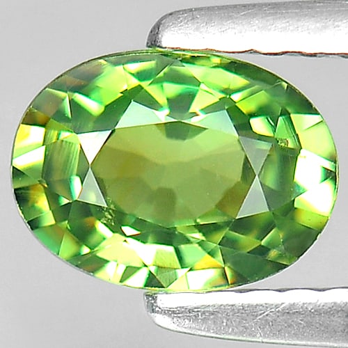 Natural Green Demantoid Garnet 0.98 Ct. Oval Shape 6.9 x 5.1 Mm. Gemstone From Madagascar: Product ID: 802922446 Product Name: Natural Demantoid Weight: 0.98 CT. Size: 6.9 x 5.1 x 3.3 MM. Shape: Oval Color: Green Clarity:VSI Luster: Very Good Gems Origin: Mardagascar Treatment: Unheated Cry