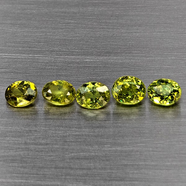 Natural Green Demantiod Garnet 1.25 Ct. 5 Pcs Oval Shape 4.3 x 3.2 Mm Gemstones From Madagascar: Product ID: 802937456 Product Name: Natural Demantoid Weight: 1.25 CT. Size: 4.3 x 3.2 x 2.5 MM. Shape: Oval Shape Color: Green Clarity:SI1 Luster: Good Gems Origin: Madagascar Treatment: Unheated Cry