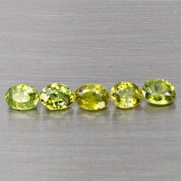 Natural Green Demantiod Garnet 1.15 Ct. 5 Pcs Oval Shape 4.2 x 3.2 Mm Gemstones From Madagascar: Product ID: 802937471 Product Name: Natural Demantoid Weight: 1.15 CT. Size: 4.2 x 3.2 x 2.3 MM. Shape: Oval Shape Color: Green Clarity:SI1 Luster: Good Gems Origin: Madagascar Treatment: Unheated Cry