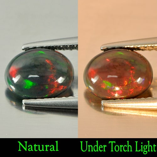 Natural Fire Red Black Opal 0.69 Ct. Oval Cabochon Shape 8.4 x 6.5 Mm. Gemstone From Ethiopia: Product ID: 818724379 Product Name: Natural Opal Weight: 0.69 CT. Size: 8.4 x 6.5 x 3 MM. Shape: Oval Cabochon Color: Rainbow Fire Red Black Clarity:Semi - Transparent Luster: Iridescent Gems Origin: