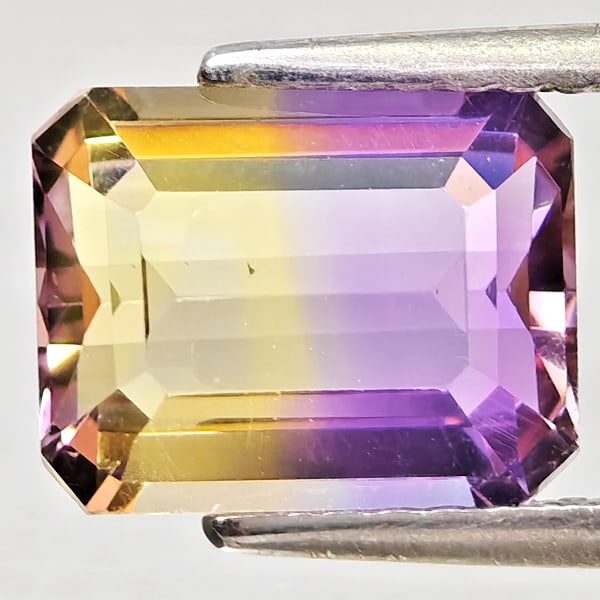 Natural Bi Color Ametrine 2.25 Ct. Octagon Shape 9 x 7.1 Mm Gemstone From Bolivia: Product ID: 800408407 Product Name: Natural Ametrine Weight: 2.25 CT. Size: 9 x 7.1 x 4.6 MM. Shape: Octagon Color: Bi Color Clarity:VSI Luster: Good Gems Origin: Bolivia Treatment: Unheated Crystal S