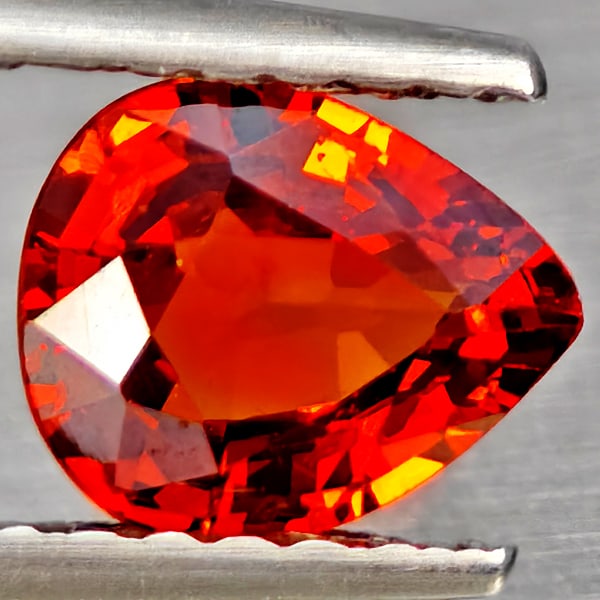 Natural Orangish Red Spessartine Garnet 0.87 Ct. Pear Shape 6.4 x 5.4 Mm Gemstones From Namibia: Product ID: 802937232 Product Name: Natural Garnet Weight: 0.87 CT. Size: 6.4 x 5.4 x 3 MM. Shape: Pear Shape Color: Orangish Red Clarity:SI1 Luster: Good Gems Origin: Namibia Treatment: Unheated Crys