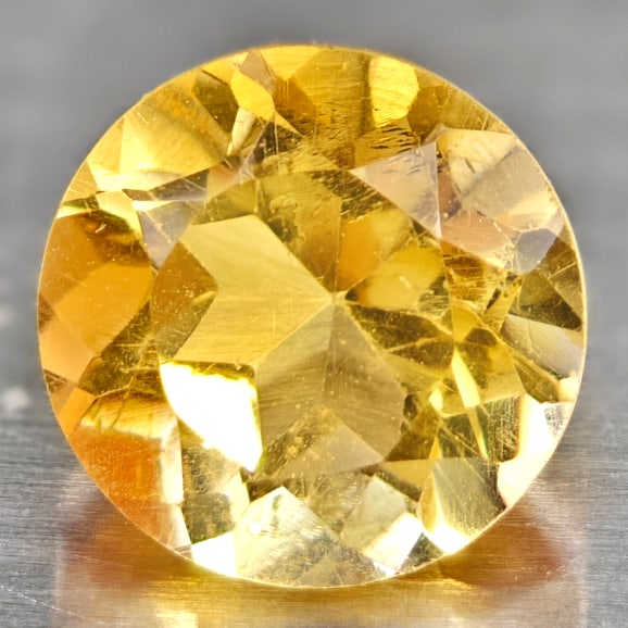 Natural Yellow Citrine 1.31 Ct. Round Shape 7 Mm. Gemstone From Brazil: Product ID: 801813568 Product Name: Natural Citrine Weight: 1.31 CT. Size: 7 x 7 x 4.2 MM. Shape: Round Color: yellow Clarity:VVS Luster: Good Gems Origin: Barzil Treatment: Unheated Crystal Structure