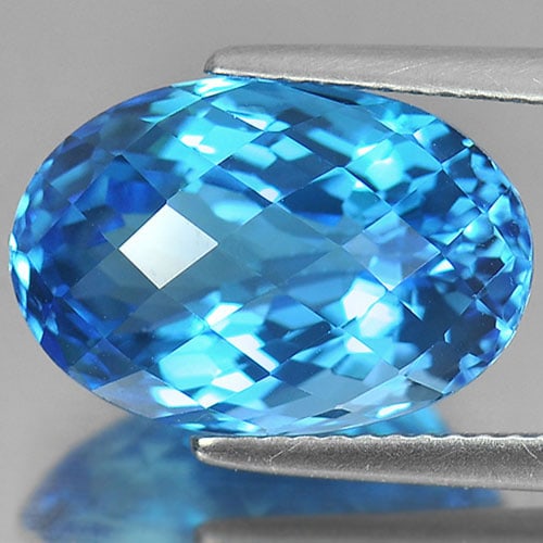 Natural Swiss Blue Topaz 10.37 Ct. Clean Oval Checkerboard Cut 15.2 x 10.4 Mm. Gemstone From Brazil: Product ID: 807165856 Product Name: Natural Blue Topaz Weight: 10.37 CT. Size: 15.2 x 10.4 x 8.8 MM. Shape: Oval Checkerboard Color: Blue Clarity:IF Luster: Very Good Gems Origin: Brazil Treatment: Tr