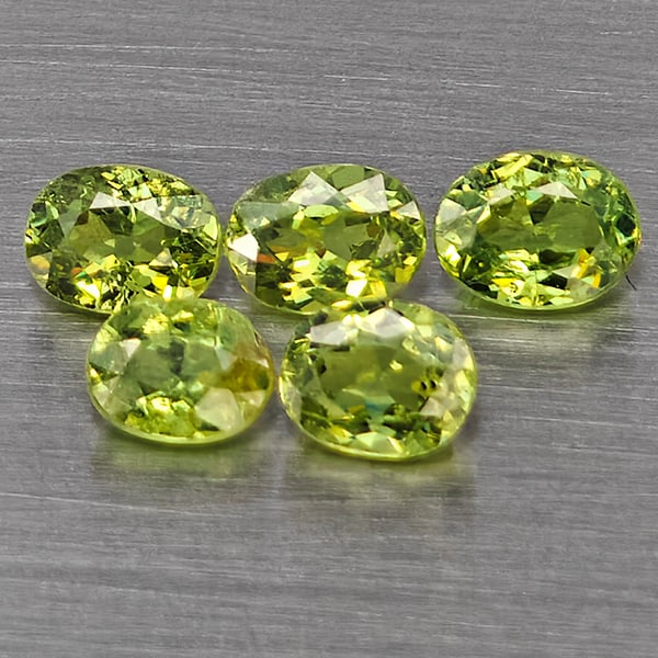 Natural Green Demantiod Garnet 1.22 Ct. 5 Pcs Oval Shape 4.2 x 3.1 Mm Gemstones From Madagascar: Product ID: 802937540 Product Name: Natural Demantoid Weight: 1.22 CT. Size: 4.2 x 3.1 x 2.6 MM. Shape: Oval Color: Green Clarity:SI1 Luster: Good Gems Origin: Madagascar Treatment: Unheated Crystal S