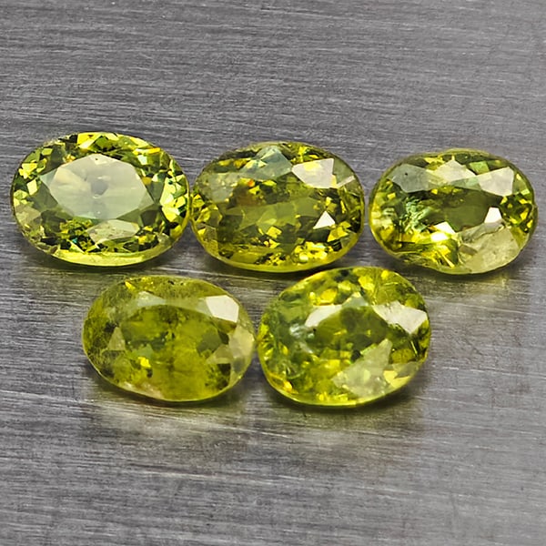 Natural Green Demantiod Garnet 1.22 Ct. 5 Pcs Oval Shape 4.2 x 3.2 Mm Gemstones From Madagascar: Product ID: 802937542 Product Name: Natural Demantoid Weight: 1.22 CT. Size: 4.2 x 3.2 x 2.2 MM. Shape: Oval Color: Green Clarity:SI1 Luster: Good Gems Origin: Madagascar Treatment: Unheated Crystal S