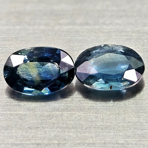 Natural Blue Sapphire 0.71 Ct. 2 Pcs Oval Shape 5.2 x 3.7 Mm Gemstones From Thailand: Product ID: 806012126 Product Name: Natural Blue Sapphire Weight: 0.71 CT. Size: 5.2 x 3.7 x 1.8 MM. Shape: Oval Color: Blue Clarity:VSI Luster: Good Gems Origin: Thailand Treatment: Heated Crystal St