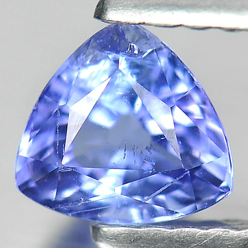 Natural Violetish Blue Tanzanite 0.66 Ct. Trilliant Shape 5.5 x 5.2 Mm. Gemstone From Tanzania: Product ID: 807007843 Product Name: Natural Tanzanite Weight: 0.66 CT. Size: 5.5 x 5.2 x 3.5 MM. Shape: Trilliant Color: Blue Clarity:VSI Luster: Good Gems Origin: Tanzania Treatment: Heated Crystal S