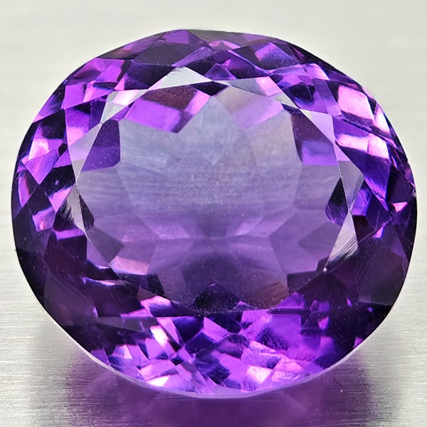 Natural Purple Amethyst 12.26 Ct. Oval Shape 14.3 x 13.1 Mm Gemstone from Brazil: Product ID: 800325449 Product Name: Natural Amethyst Weight: 12.26 CT. Size: 14.3 x 13.1 x 10 MM. Shape: Oval Color: Purple Clarity:VSI Luster: Good Gems Origin: Brazil Treatment: Unheated Crystal Str